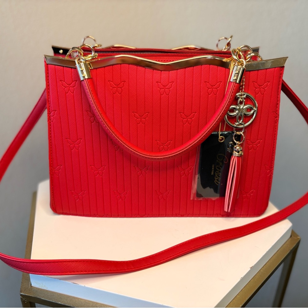 Elegant Red Handbag with Gold Accents